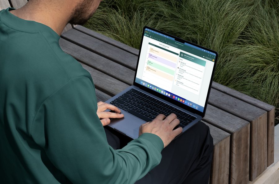 A tutor using the platform on a laptop outdoors